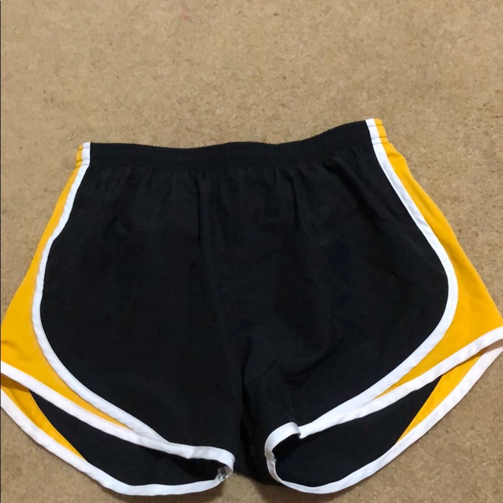Black and gold athletic shorts